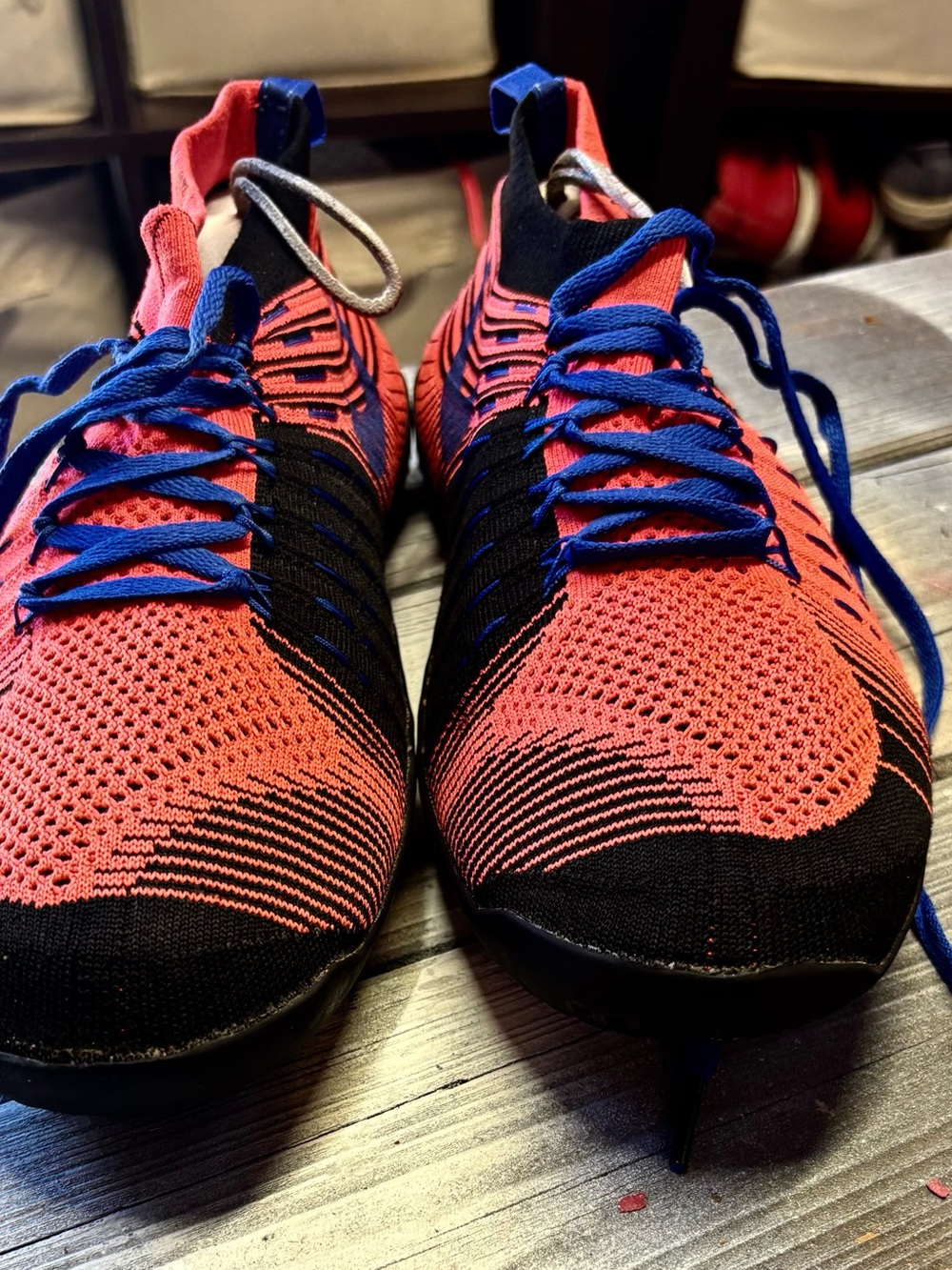 Nike Flyknit 2.0 sneakers in black and orange with blue accents mens 10.5